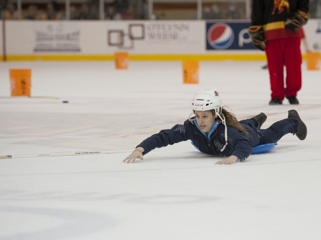 Carina McEwen competes during the 2nd intermission challenge during Loyalist College Night at the Yardmen Arena.
