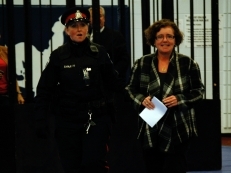 Constable Ann Earle escorts a relieved Jane Harrison, Acting Dean of Media Studies, from the cell once Jane raised her bail. 