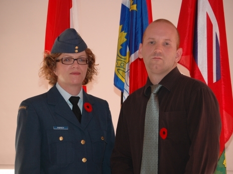 Project Hero Scholarship recipient, Louis O’Driscoll with Loyalist College President Maureen Piercy, Honorary Colonel of 8 Air Communication and Control Squadron (8 ACCS) at the Loyalist College Remembrance Day Ceremony. 