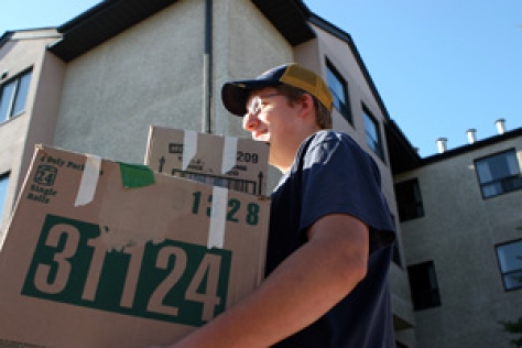 Loyalist Residence Village Man with Boxes